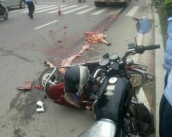 Female biker with high heels was hit by a truck