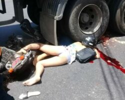 Couple on motorbike smashed by truck