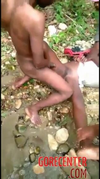 Group of men raping a woman by the river • GoreCenter