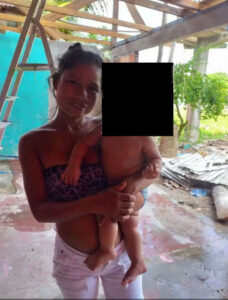 Putrified female with knife protruding from pussy