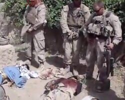 US Marines pee on dead bodies of Taliban soldiers
