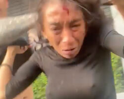 Woman accused of theft was beaten on the street