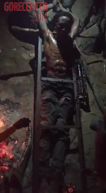 Dude gets torture with hot metal • GoreCenter