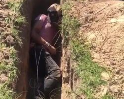 Execution of man in shallow grave