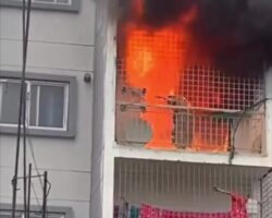 Woman screams on balcony as she burns to death