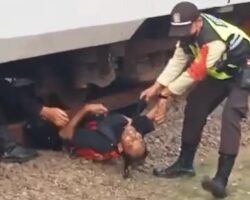 Pulling a suicide from under a train