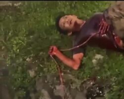 Dude with his throat cut in a ditch