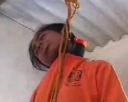 Hanged girl in school uniform