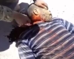 Russians from Wagner group beheading Syrian