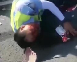Traffic cop run over by truck