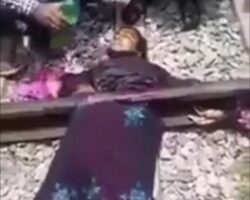 Woman is still moving after being cut in half by train