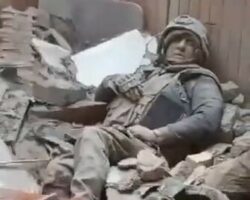 Chechen fighters show house full of dead Russians