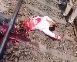 Dude cut in half lying on train tracks, but he's still alive