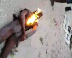 Haitian gangsters are tortured with fire