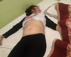 Lifeless woman found in bed