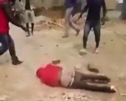 Stoning a man in front of police station