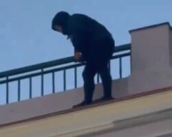Woman commits suicide by jumping off roof of building