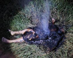 Burning the corpse of alleged female snitch