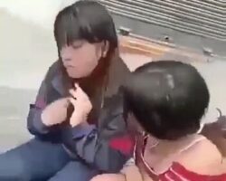 Three teen girls bullying and beating a girl
