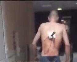 Man arrives at hospital with knife stuck in his back
