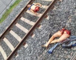 Suicide guy cut in half by train