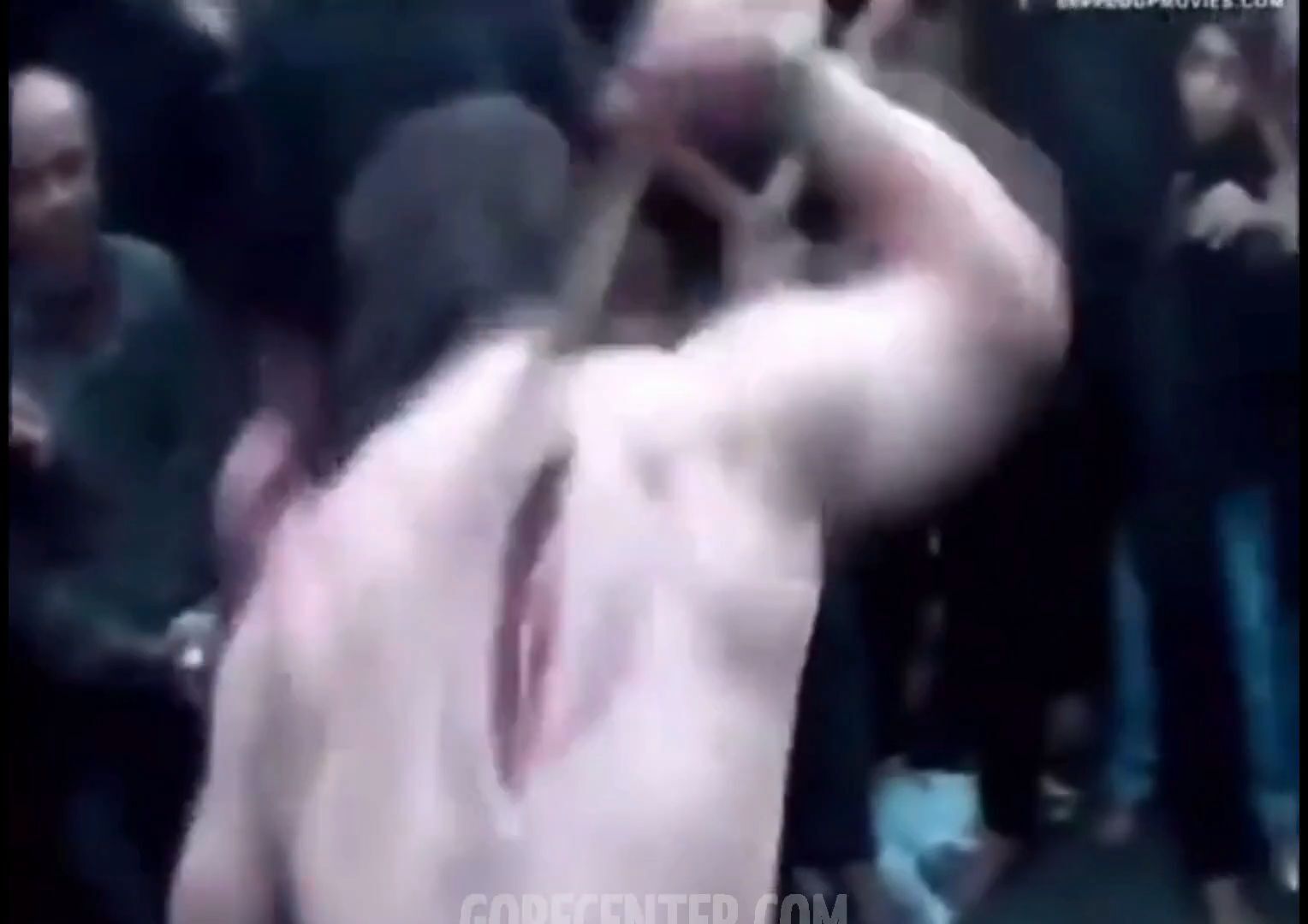 Dude cuts open his back with machete for religious reasons • GoreCenter