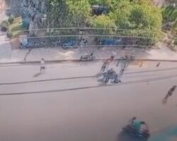 Woman and child hit by motorbike while crossing road