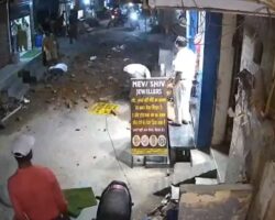 Falling wall kills one man and injures another two