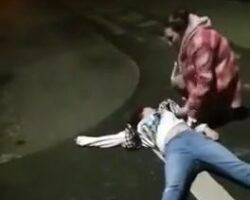Woman is brutally beaten by guy during street fight