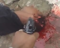 Brazilian gangster is overkilled in the middle of street