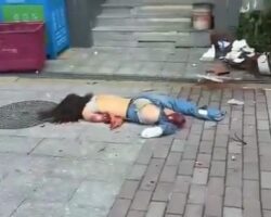 Female suicidal jumper after hitting the ground