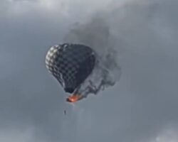 Passenger falls from burning hot air balloon mid-flight