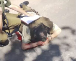 Police officer hit by thug on motorcycle