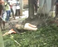 Pulling dead body out of well