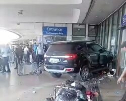 Two dead, four injured after car crashes into airport terminal