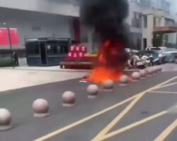Chinese woman set herself on fire in front of government office building