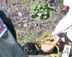 Dead hogtied woman found by roadside