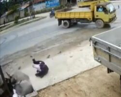 Motorcycle crash sends two Indonesian students into manhole