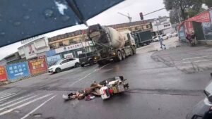Motorcyclist crushed by cement truck