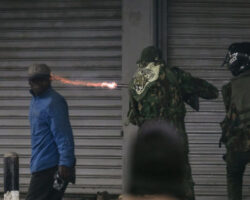 Street vendor shot dead by police officer during protest