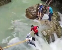 Tourists die while attempting to cross river