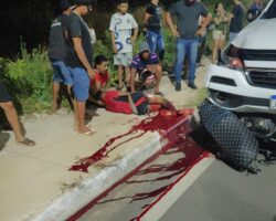 Young man on motorcycle hit and dragged by car
