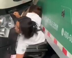 Chinese woman crushed between two trucks