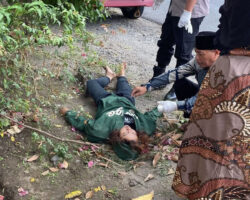 Dead woman found dumped near busy road