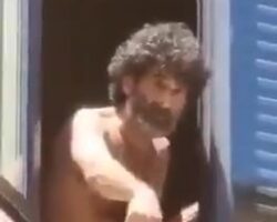 Desperate guy jumps out of window in front of shocked bystanders