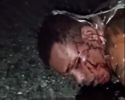 Executed man found wrapped in plastic sheet