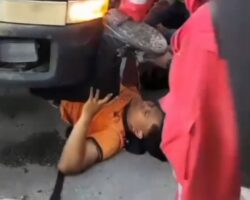 Motorcyclist got caught beneath truck chassis