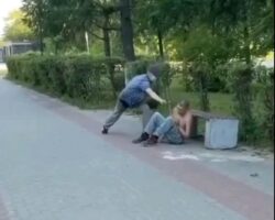 Russian youths amuse themselves by tormenting drunk man