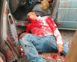 Two men shot to death in car near cemetery in Guayaquil