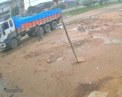 Young man commits suicide by lying down under truck